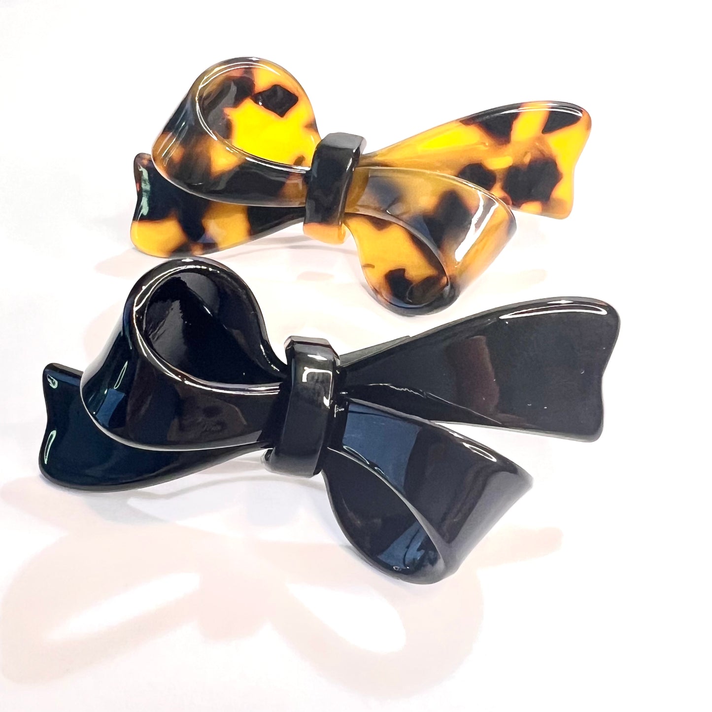 “Elevate your style with our Deluxe Mini French Barrette Duo in Classic Black and Elegant Tortoise, each 2.5 inches long.”